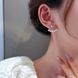 Сережки-пусети у вигляді золотистого серця та перлинок Podarkus біжутерія золотисті BK281-G BK281-G фото 4