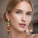 Серьги длинные подвески Лицо глаза губы золотистые Podarkus BK1111-G BK1111-G фото 1